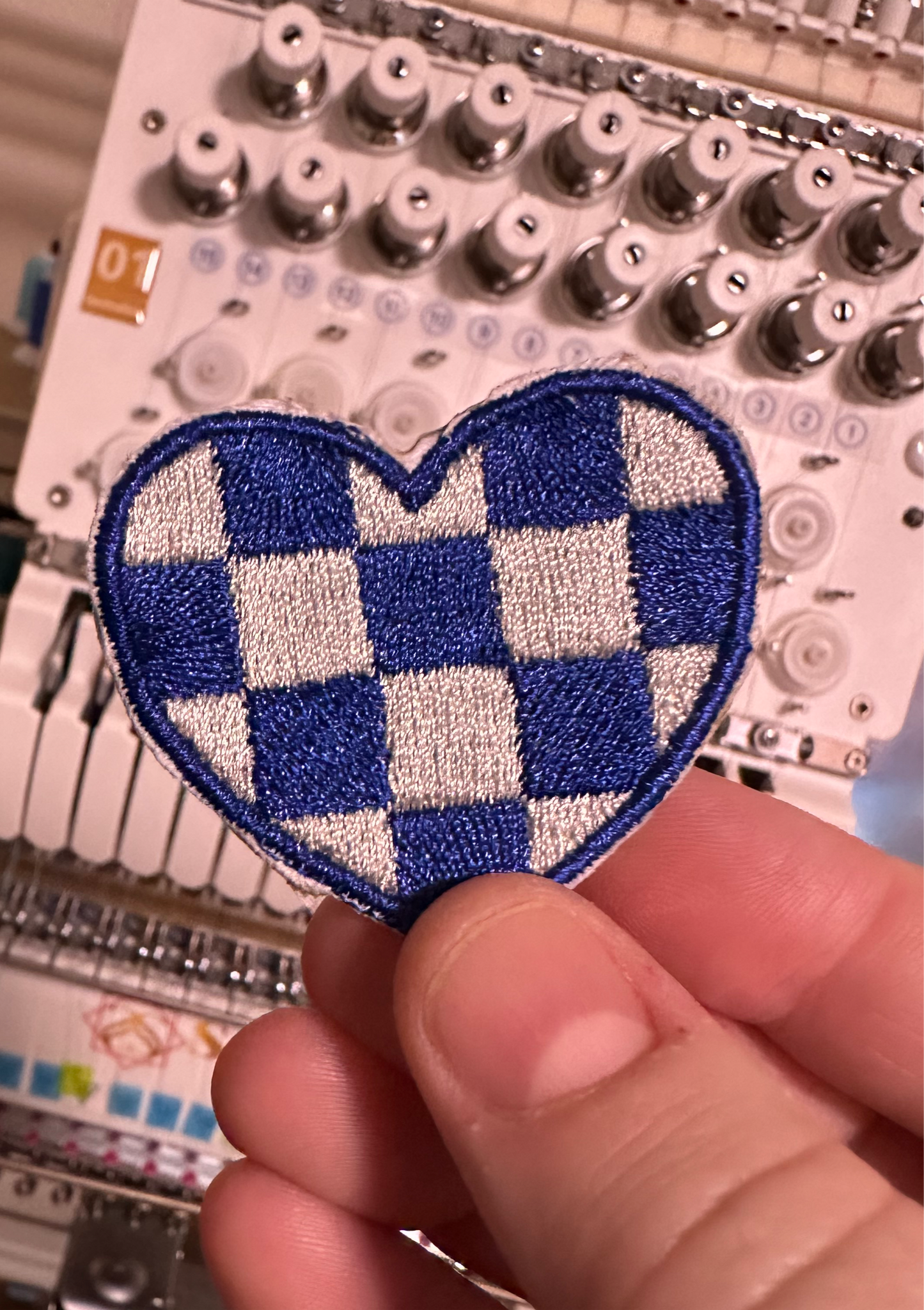 Checkered heart patch iron on