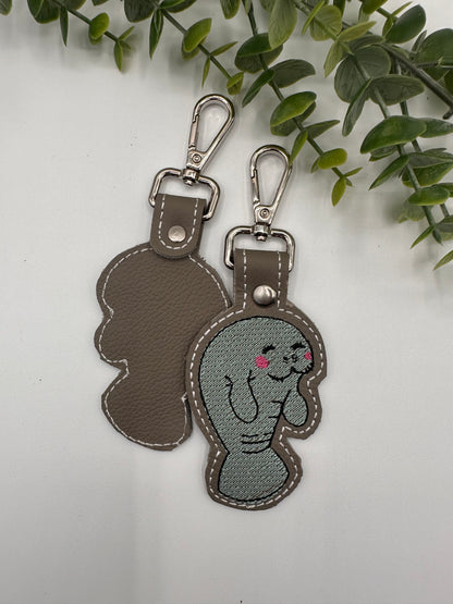 Manatee embroidered leather keychain