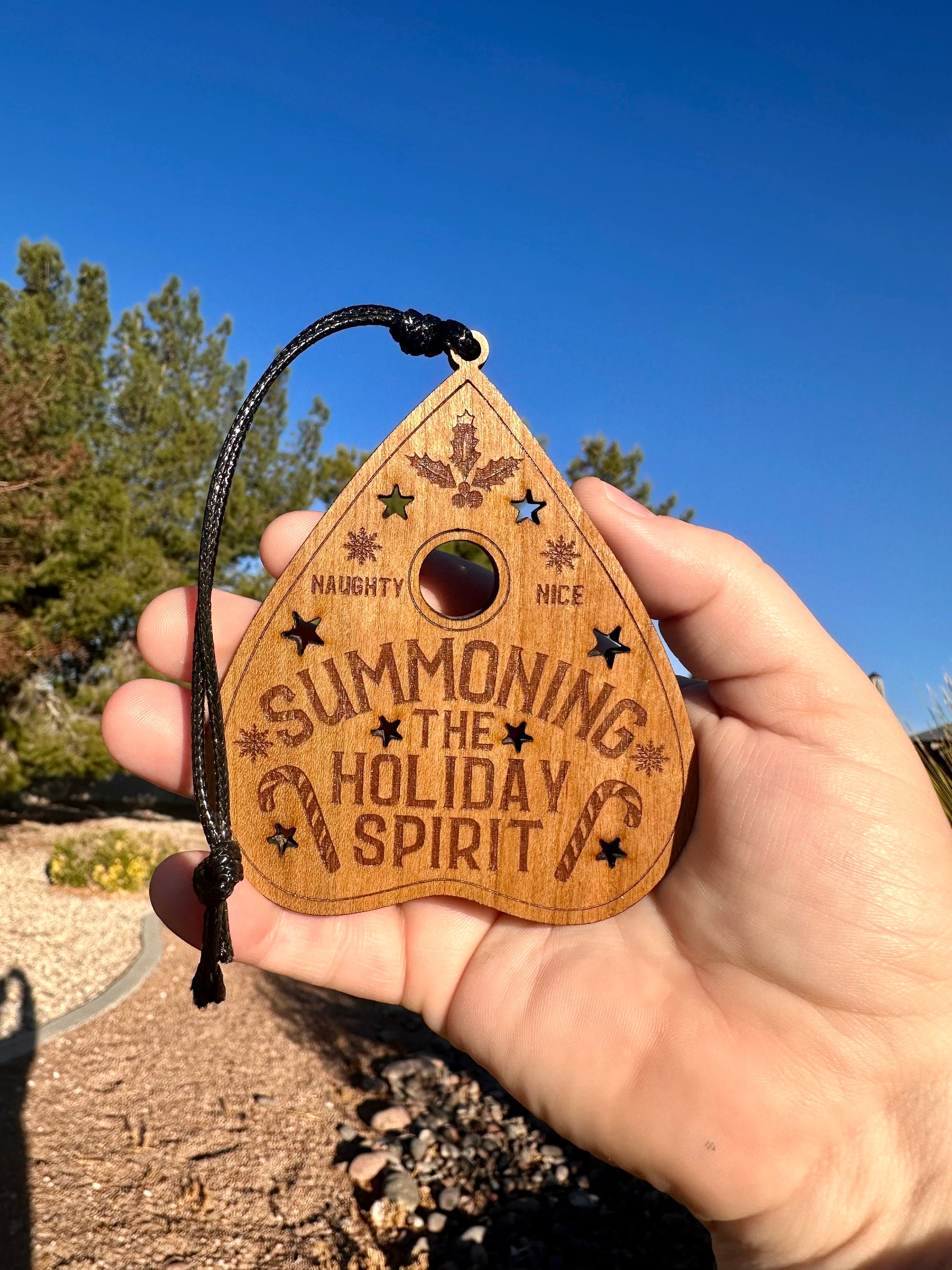 Summoning the Holiday Spirit Ornament, Handmade Cheery plywood ouija planchette decor. Fun and spooky Christmas gift.