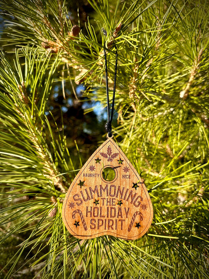 Summoning the Holiday Spirit Ornament, Handmade Cheery plywood ouija planchette decor. Fun and spooky Christmas gift.