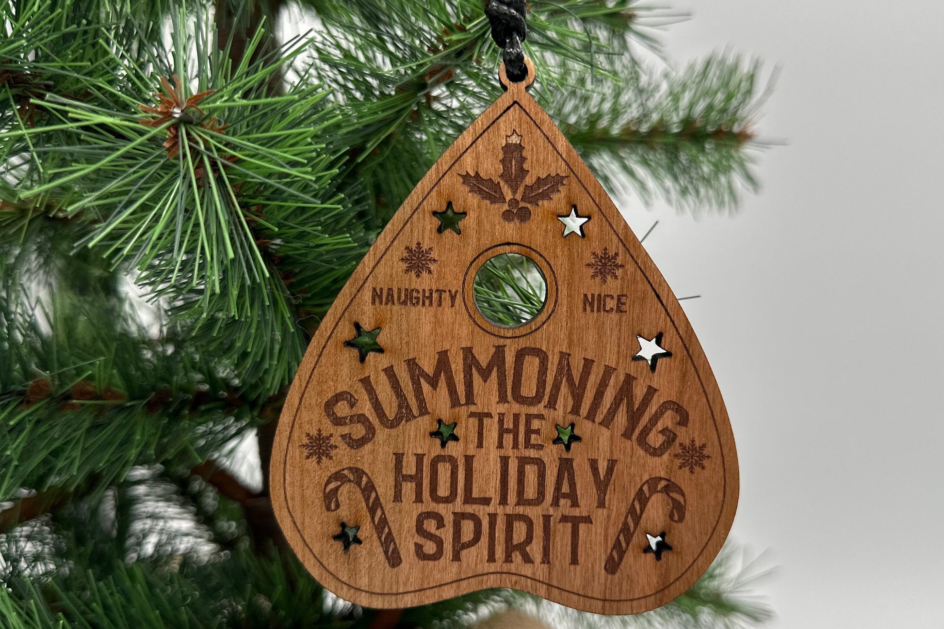 Summoning the Holiday Spirit Ornament, Handmade Cheery plywood ouija planchette decor. Fun and spooky Christmas gift.