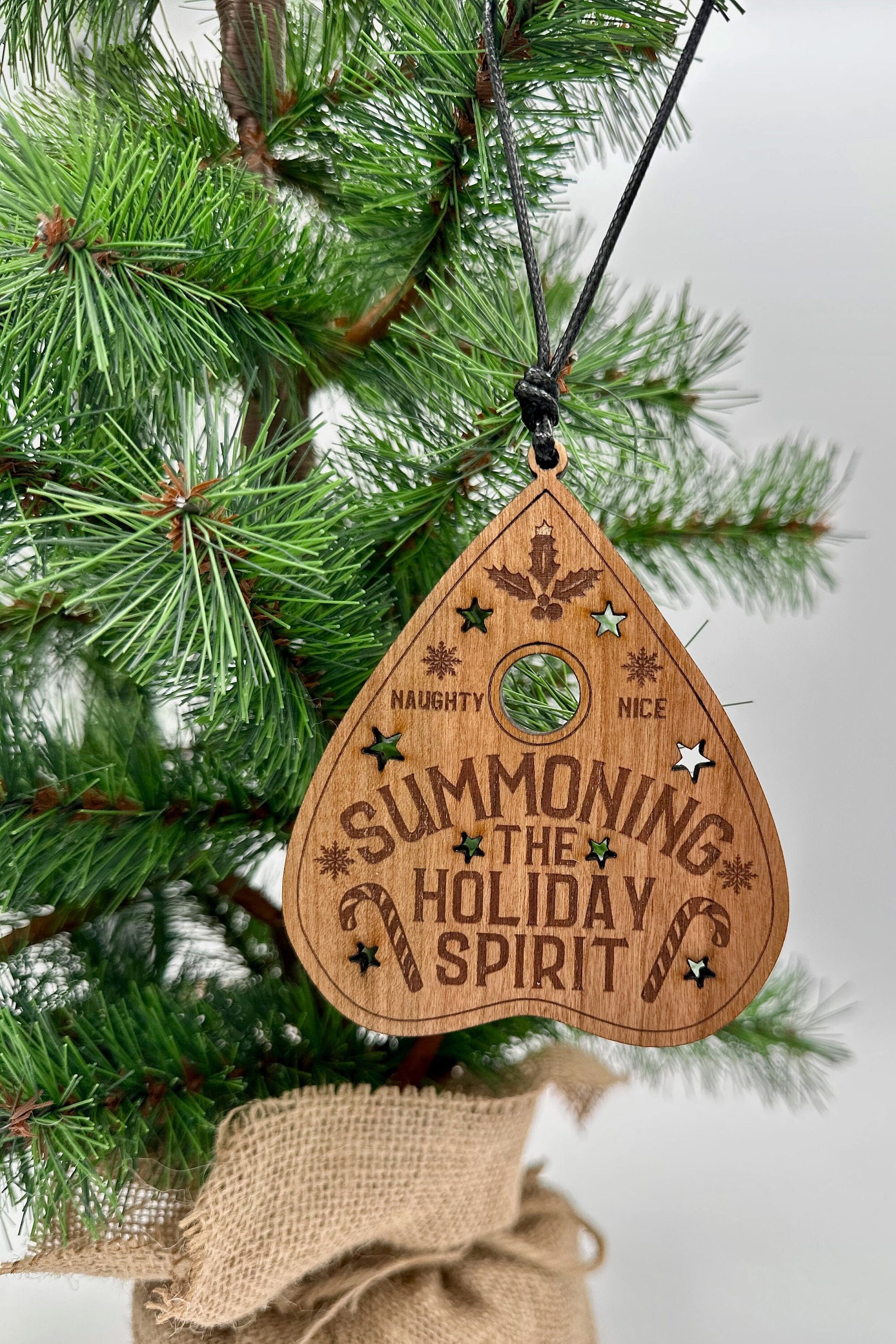 Summoning the Holiday Spirit Ornament, Handmade Cheery plywood ouija planchette decor. Fun and spooky Christmas gift.