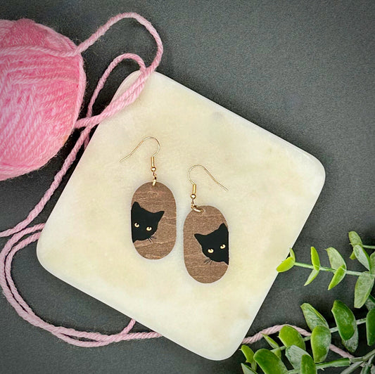 Oval Black Cat Wooden Dangle Earrings | Mother's Day, Lightweight Void Kitty with Gold Eye Shine | Mischievous Peeking Kitten Cat Lover gift